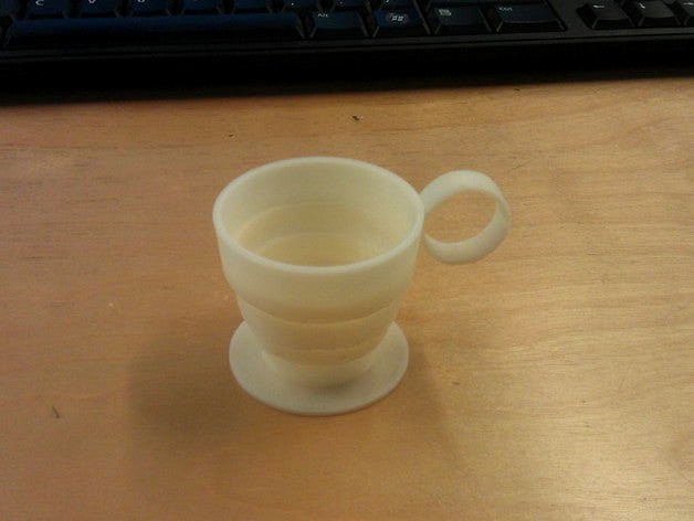 Collapsible Shot Glass - Holds Liquid! by sporkins