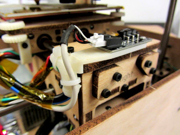 X-axis strain relief and build platform wire guide by Ellindsey