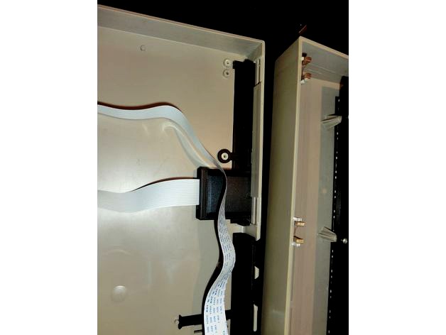 SD extension holder back-plate for C64 bread-bin case by NegSol