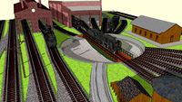 Turntable module layout with steam locomotive and roundhouse