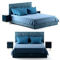 Erica bed with upholstered headboard and quilted bedspread