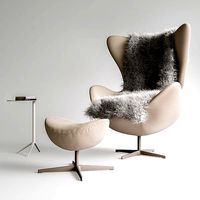 egg chair with table and ottoman