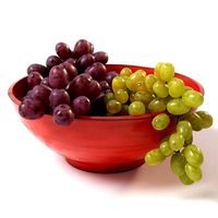Grapes in a red bowl