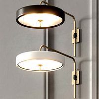 Revolve Sconce by Bert Frank