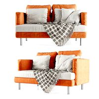Double sofa with plaid