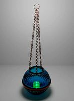 Blue glass candle holder on chains
