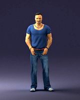 Strong man in a blue t-shirt and jeans 0090