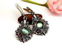Dangle earrings with complex pattern in fantasy style | 3D