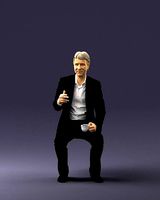 Man in a business suit is sitting 0240