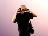 Ajay 11562 - Asian Man Walking Casually With Headphones
