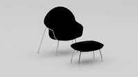 Womb and an ottoman chair