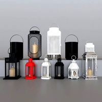 A set of candlesticks lanterns from Ikea