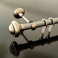 Bracket and finial for curtain rods
