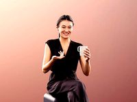 Francine 11285 - Sitting Asian Woman With Cup Talking