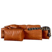 Frameless sofa with pillows and blanket