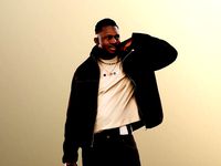 Danny 11731 - Young Black Man Standing With Bag