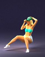 Blonde girl with a tattoo sitting 0307