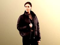 Rachel 11912 - Woman in warm jacket waiting