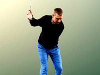 Steve 11780 - Golfer Swinging At The Ball With Golfbag