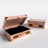 Suitcase record player Crosley Pink box