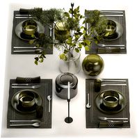 Table Setting For 4 Persons With A Bouquet