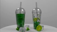 Green drink with lime and mint in the plastic cups