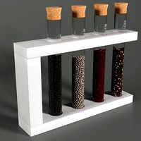 Stand with glass test tubes filled with pepper