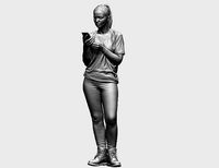 young girl looking on iphone in sportswear and timberland boots