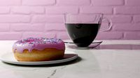 donut with a cup of coffee