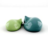resting cat figures
