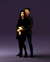 man in gray hugs woman 0629
