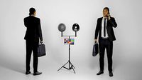 Young businessman with bag talking on mobile phone 283