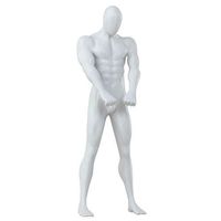 A male mannequin stands in a pose like a karate 151