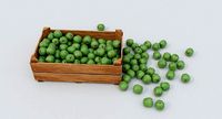 Wooden crate and green apples