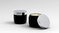 model jar of gold cream with silver lid