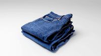 Pile or stock of folded blue jeans pants wardrobe