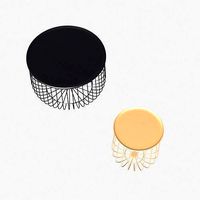 Modern round metal table in black and gold version