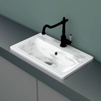 marble sink with mixer faucet and pipes