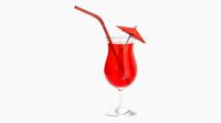 tulip glass with orange juice umbrella and straw