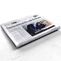 Inter Herald Tribune folded newspaper