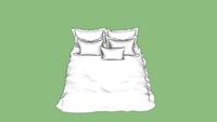 cama con almohadas