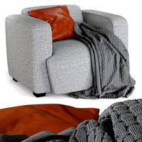 Modern gray fabric armchair with cushion and knitted wool plaid (128820)