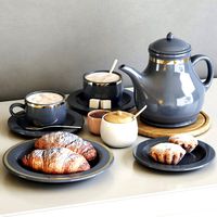 Tea set with croissant and muffin (102251)