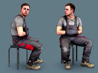 Foreman in Overalls Sitting