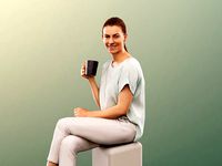 Abby 13358 - Sitting Woman In White Clothing With Coffee