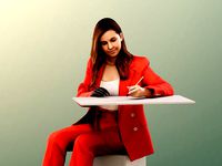 Nadine 13457 - Writing Business Woman Sitting On Desk