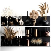 collection of decor dried flowers on a shelf