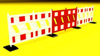 White and red plastic road barriers