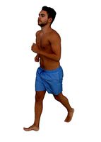 Young Man in Swimsuit running