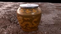 glazed water jar with dragon patterns